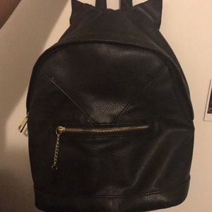 A cat backpack and 2 chokers
